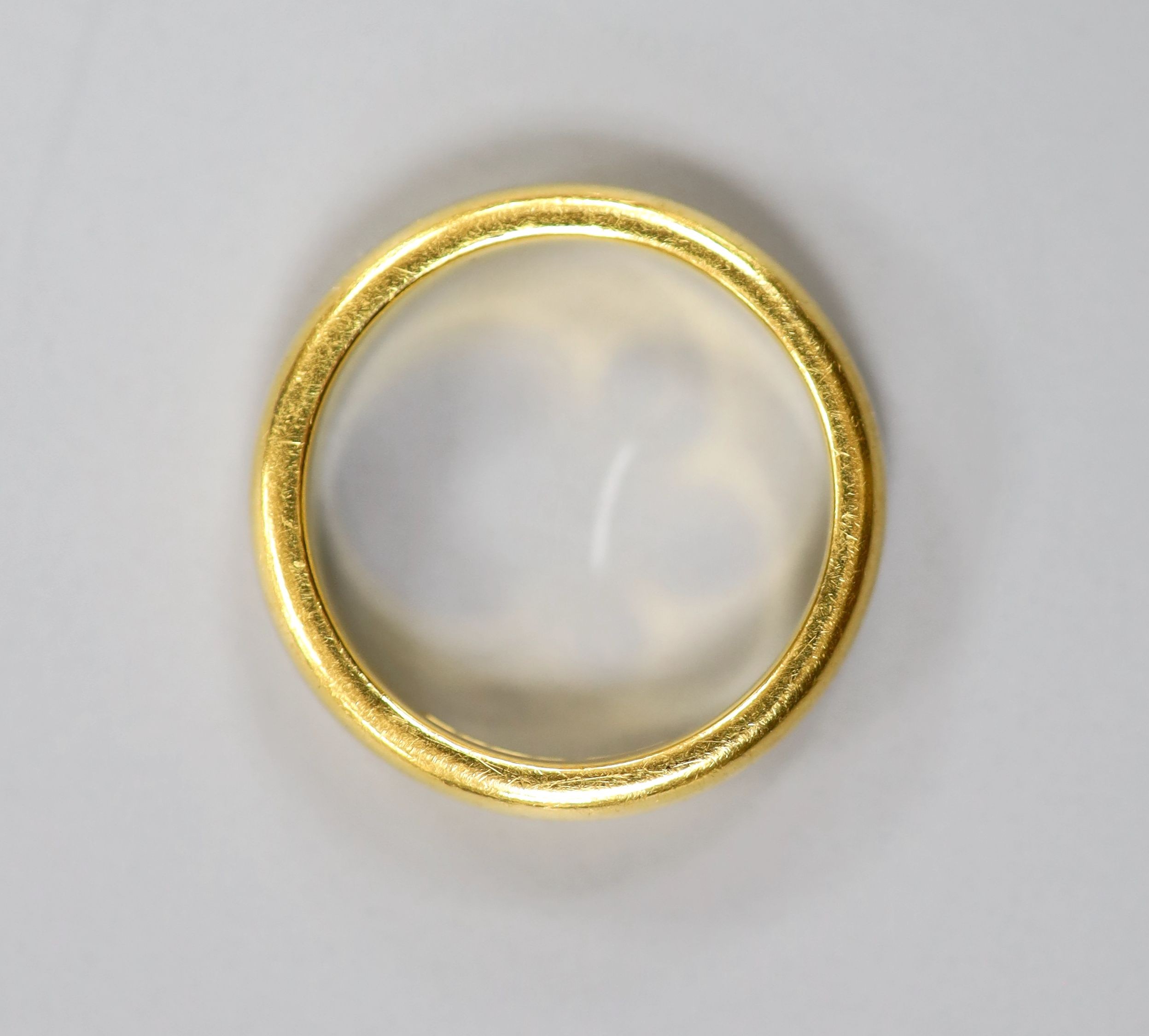 A 1930's 22ct gold wedding band, size K/L, 6.9 grams.